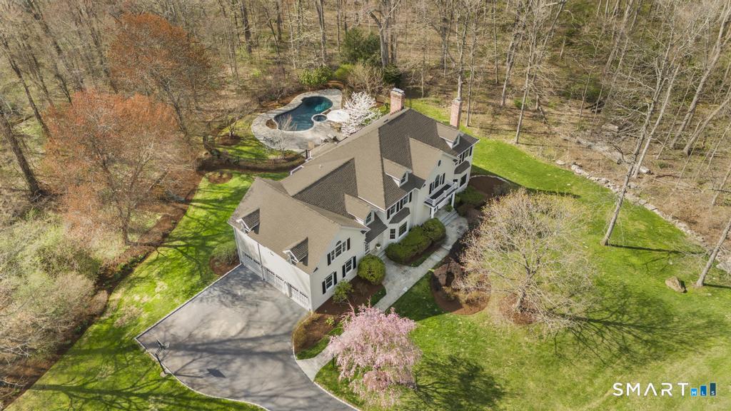 8 Maplewood Lane Wilton, CT 06897 - Photo 35 of 40 aerial view of a house with a yard