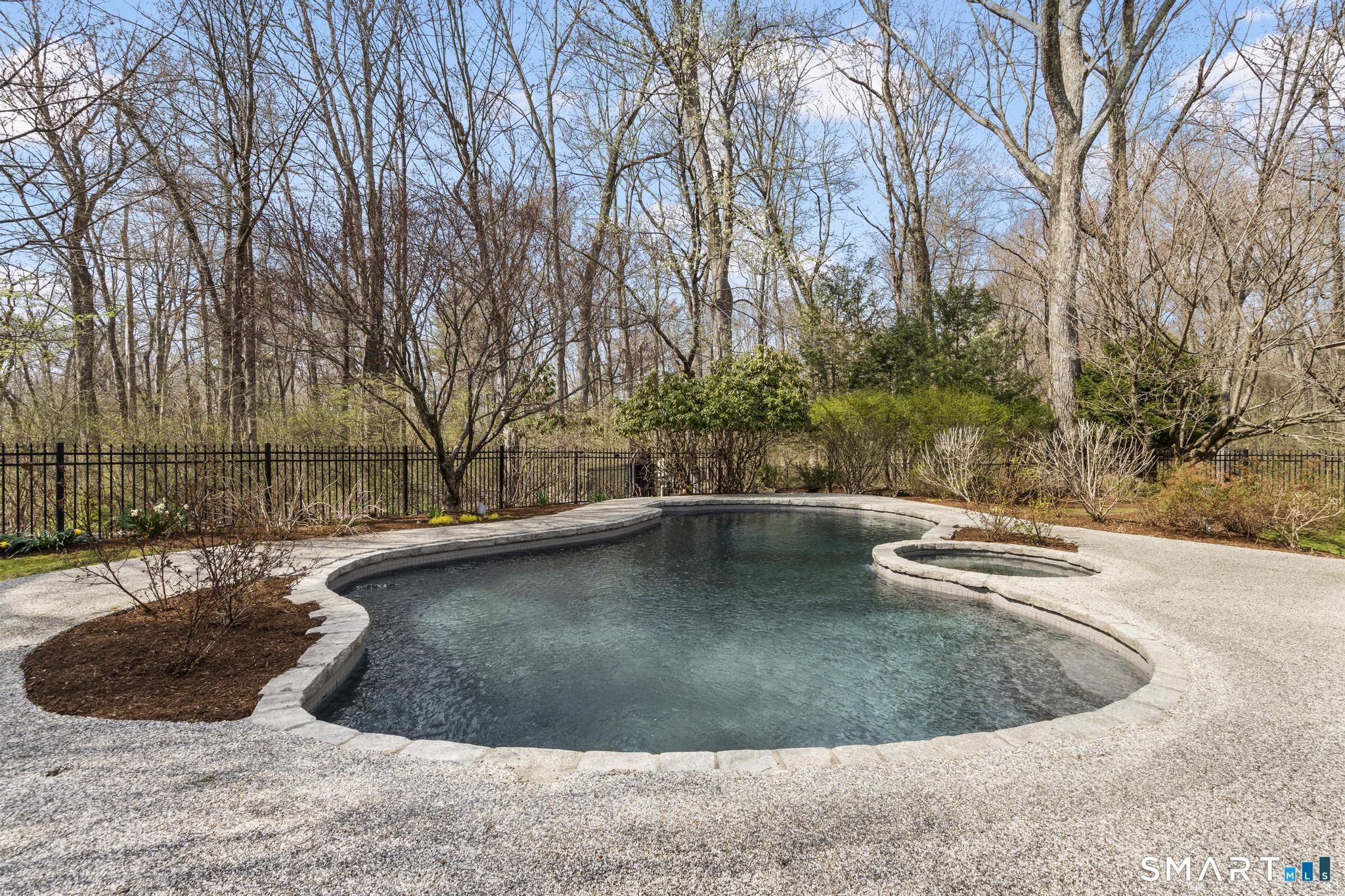 8 Maplewood Lane Wilton, CT 06897 - Photo 39 of 40 a view of a swimming pool with a yard