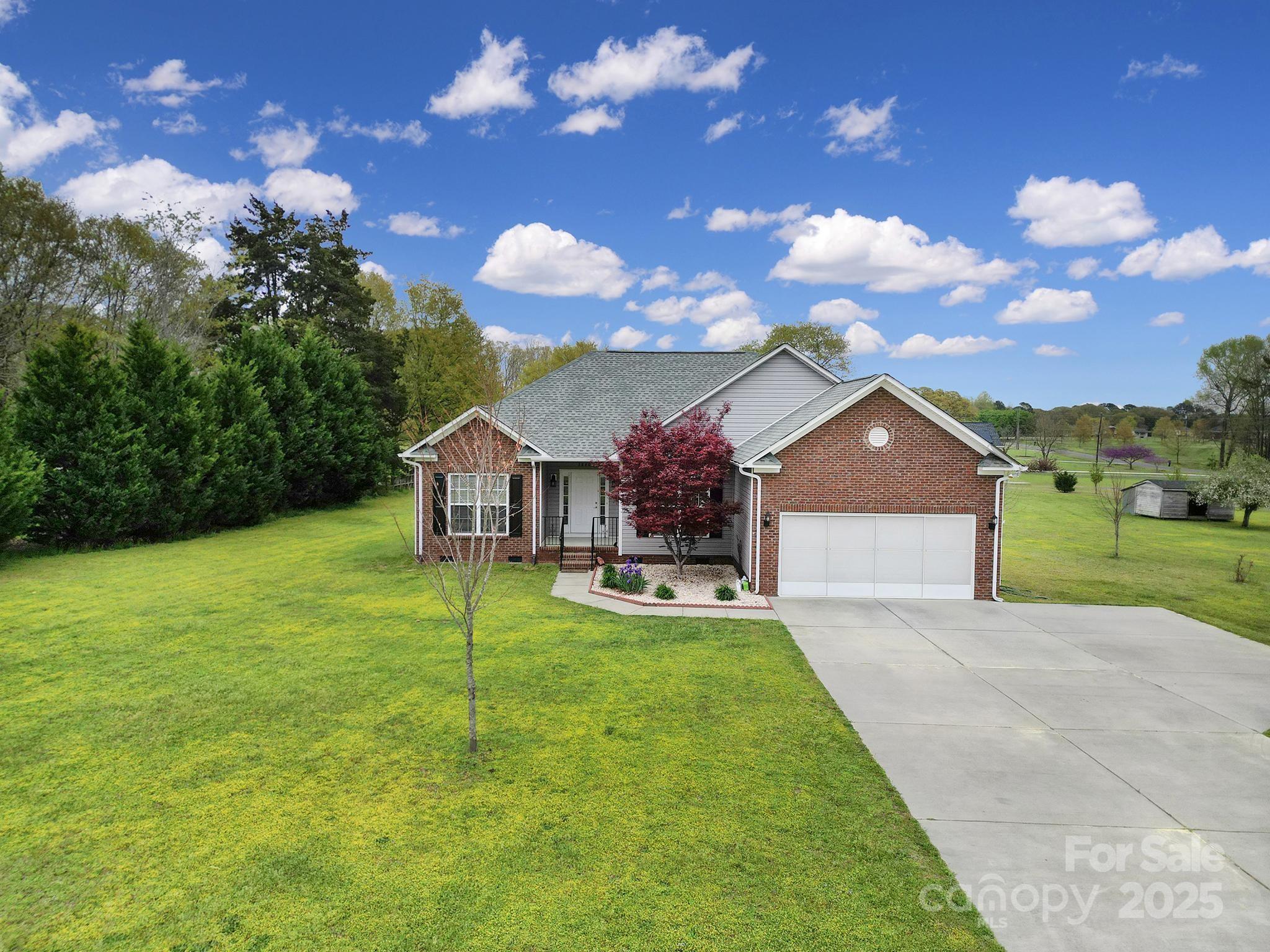 2880 Harmony Road Catawba, SC 29704 - Photo 1 of 37 a view of a house with backyard and garden