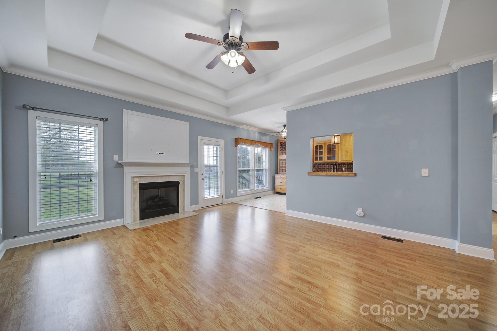 2880 Harmony Road Catawba, SC 29704 - Photo 8 of 37 a view of empty room with wooden floor and fan