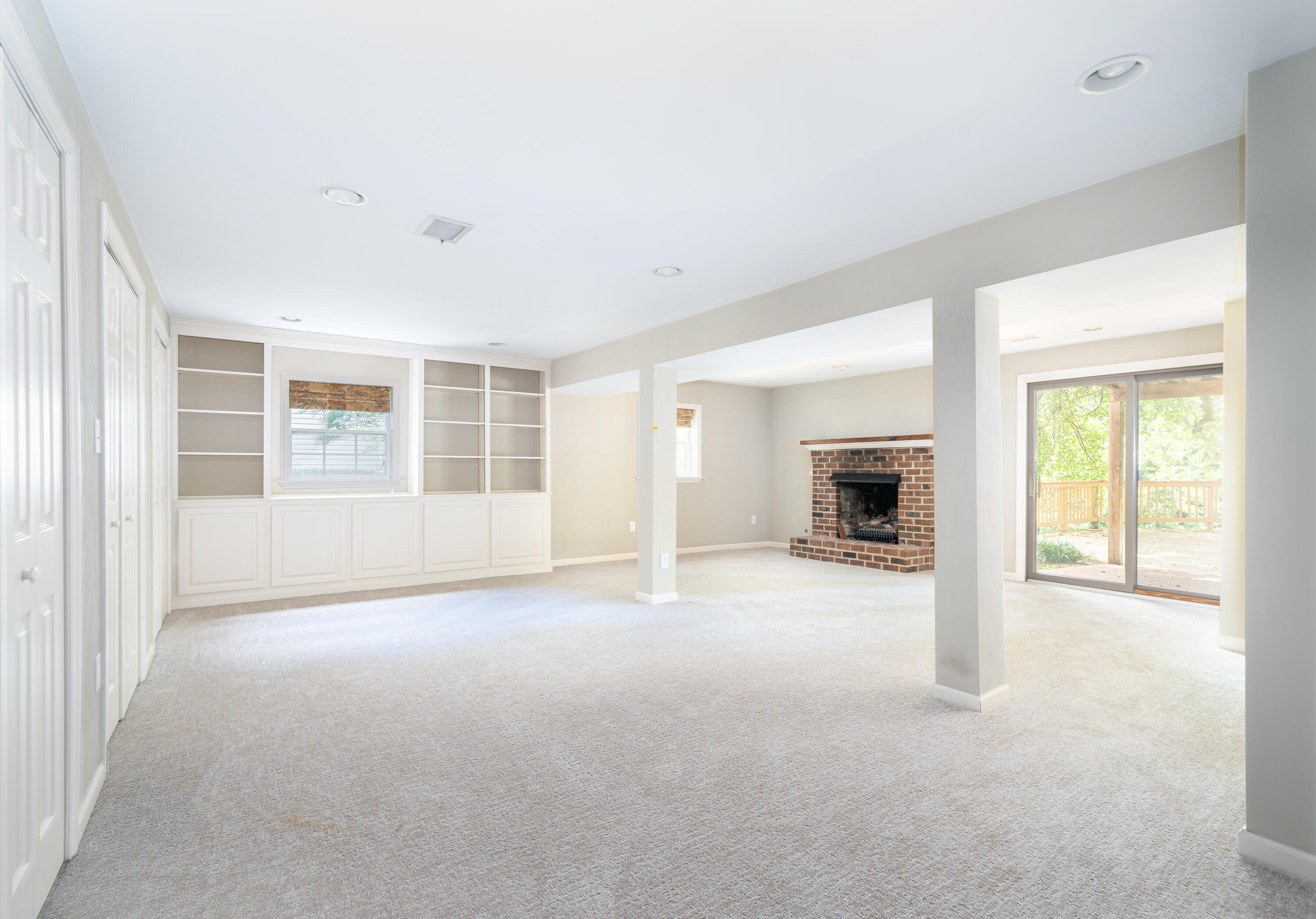 803 Red Lane Salem, VA 24153 - Photo 14 of 24 an empty room with furniture and a fireplace