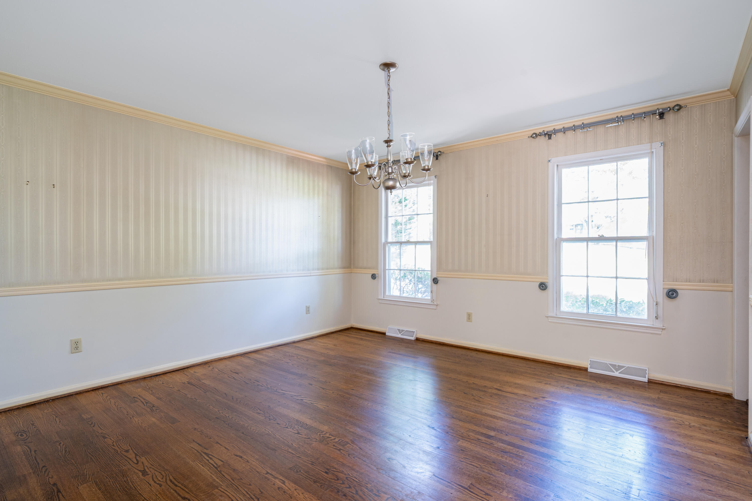 803 Red Lane Salem, VA 24153 - Photo 2 of 24 an empty room with wooden floor and windows