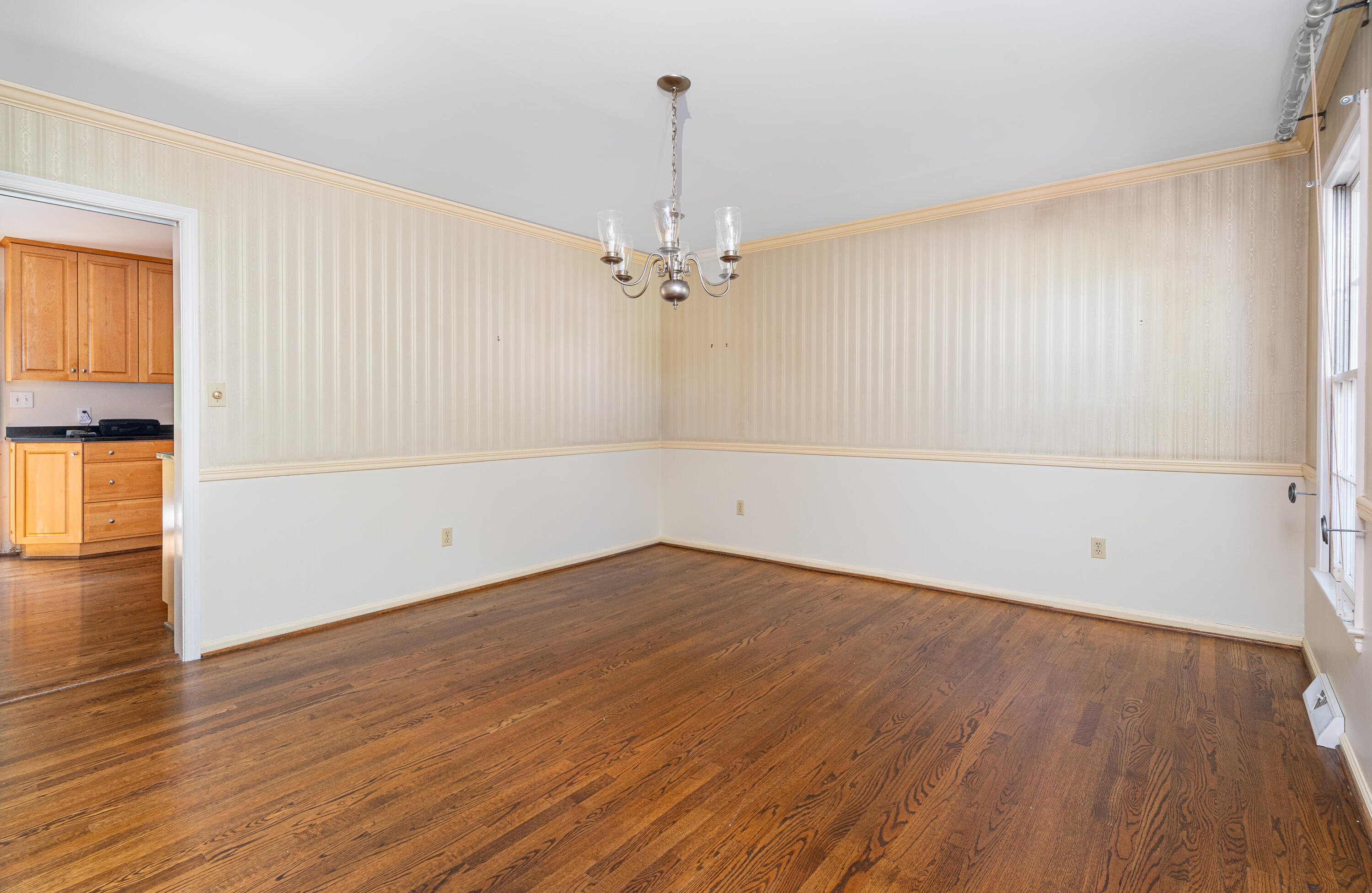 803 Red Lane Salem, VA 24153 - Photo 3 of 24 an empty room with wooden floor and windows