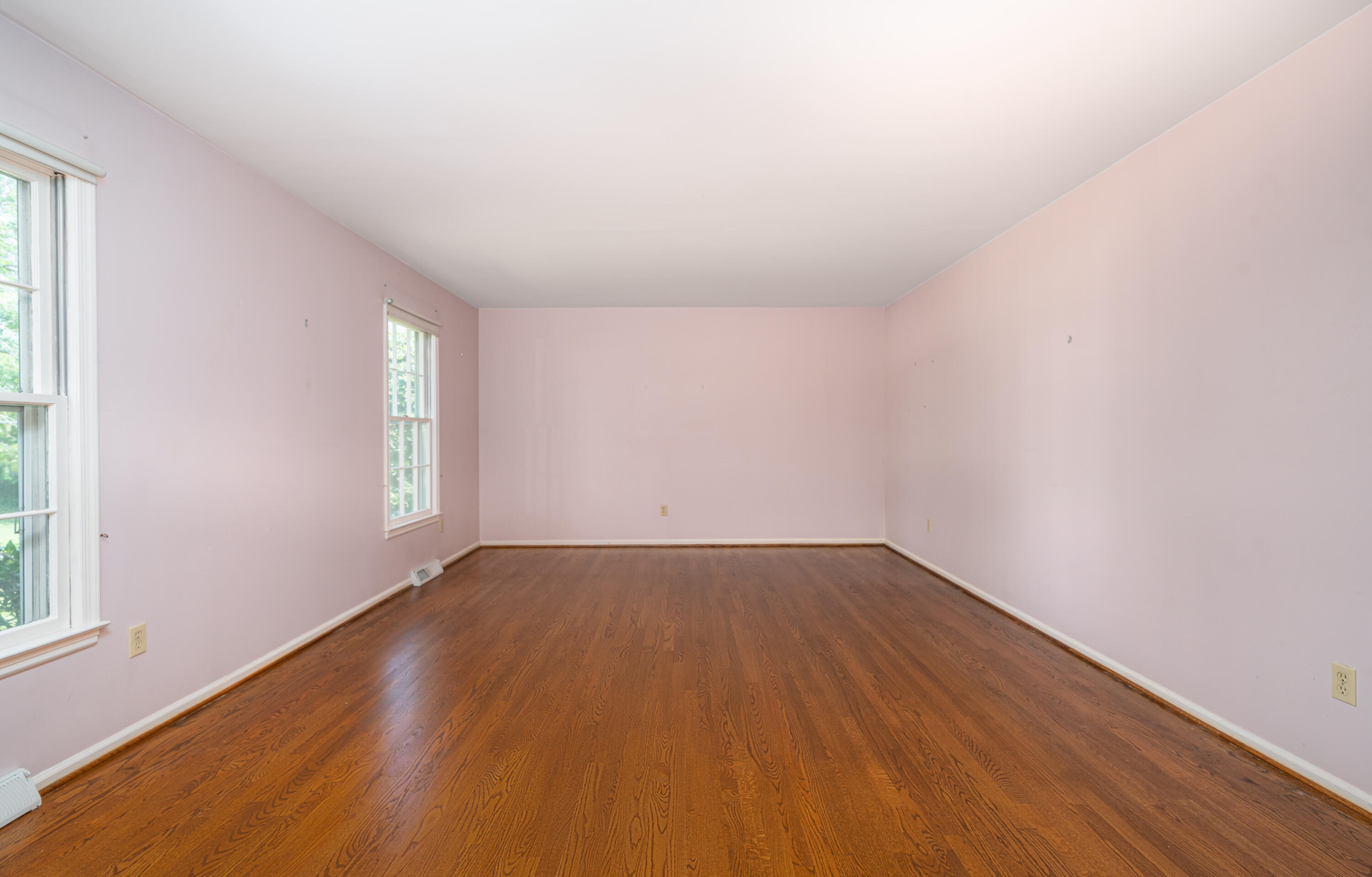803 Red Lane Salem, VA 24153 - Photo 4 of 24 an empty room with wooden floor and windows