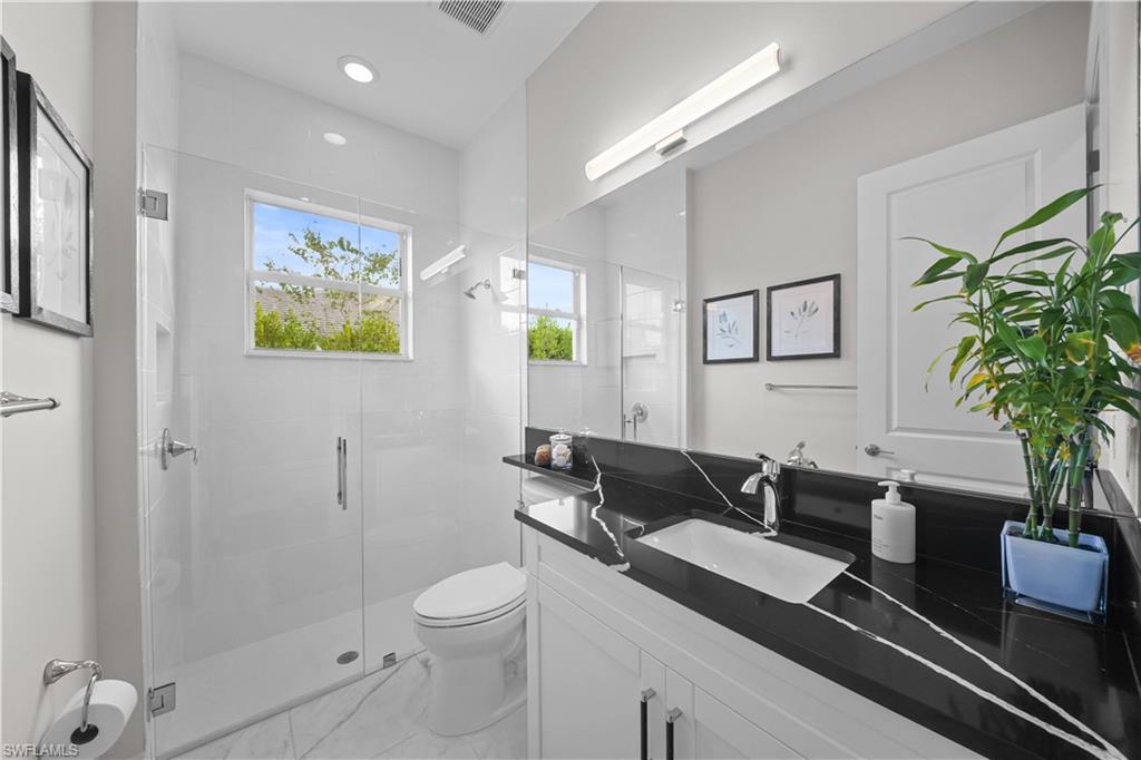 12092 Eucalyptus Way Naples, FL 34120 - Photo 21 of 50 a view of a workspace with furniture