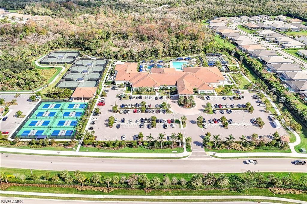 12092 Eucalyptus Way Naples, FL 34120 - Photo 38 of 50 an aerial view of residential houses with outdoor space