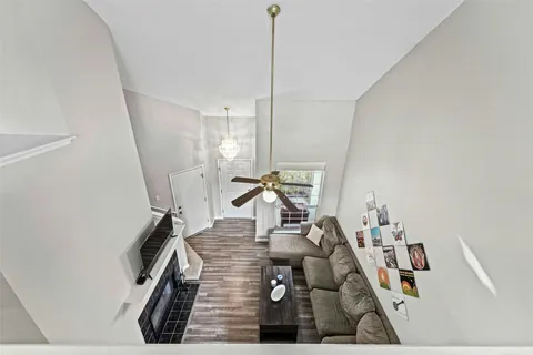 a view of a living room with furniture and floor