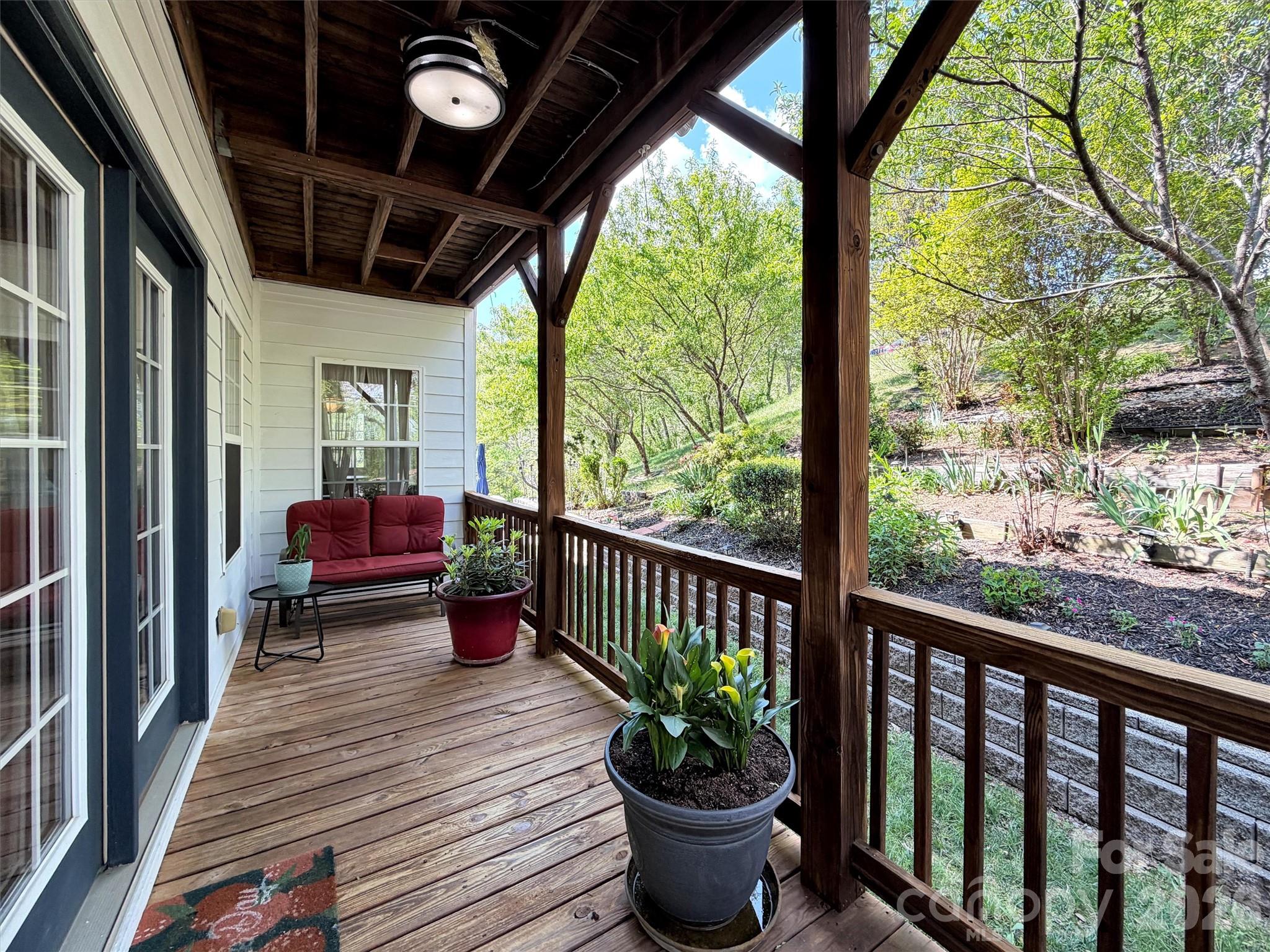 237 Midway Crossing Drive Clyde, NC 28721 - Photo 14 of 42 a view of porch with seating space