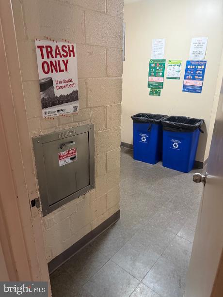 1121 University Boulevard West, Unit 1312 Silver Spring, MD 20902 - Photo 15 of 17 Efficient waste management area.