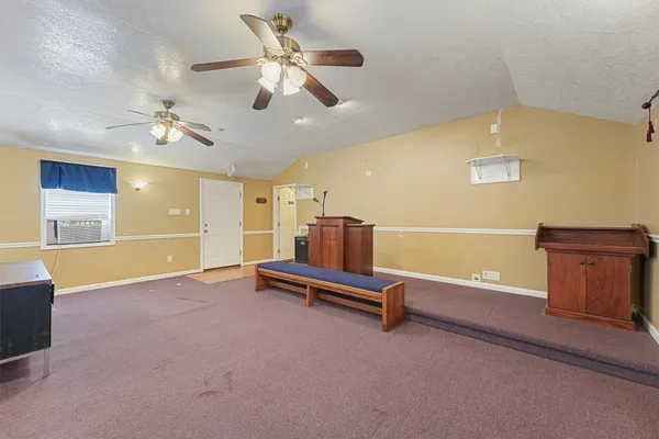 a living room with furniture pool and a table