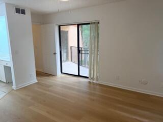 8189 Severn Drive, Unit C Boca Raton, FL 33433 - Photo 13 of 24 Primary Bedroom With Balcony