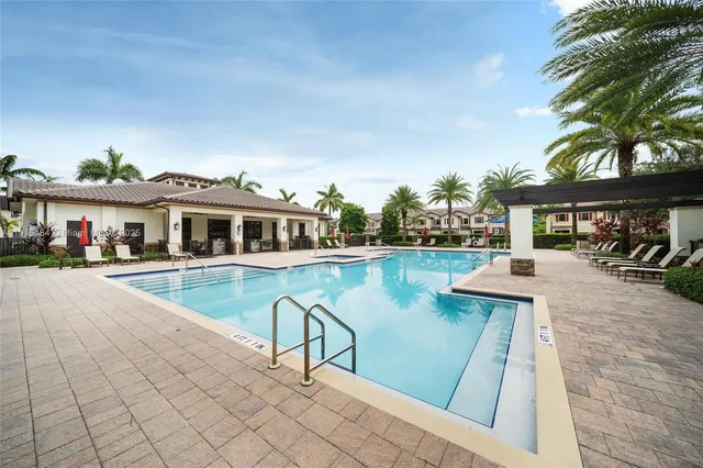 a living room with furniture and flat screen tv