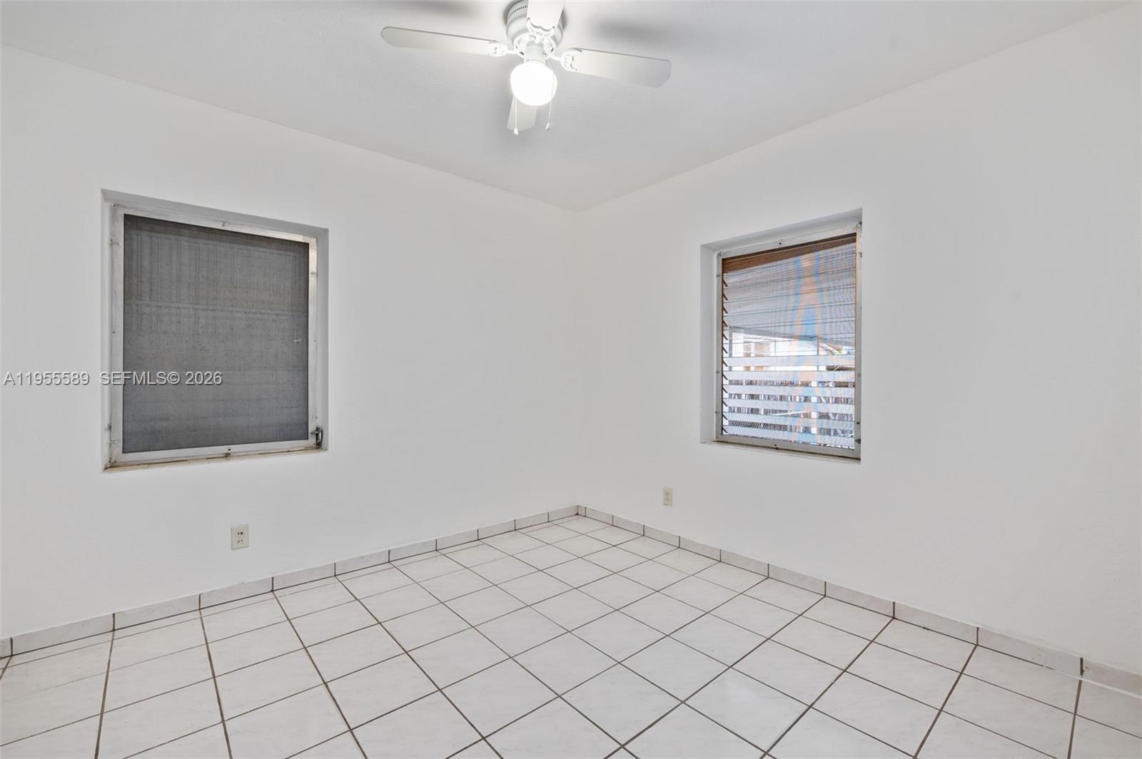 42 East 16th Street Hialeah, FL 33010 - Photo 16 of 30 a view of an empty room with a window