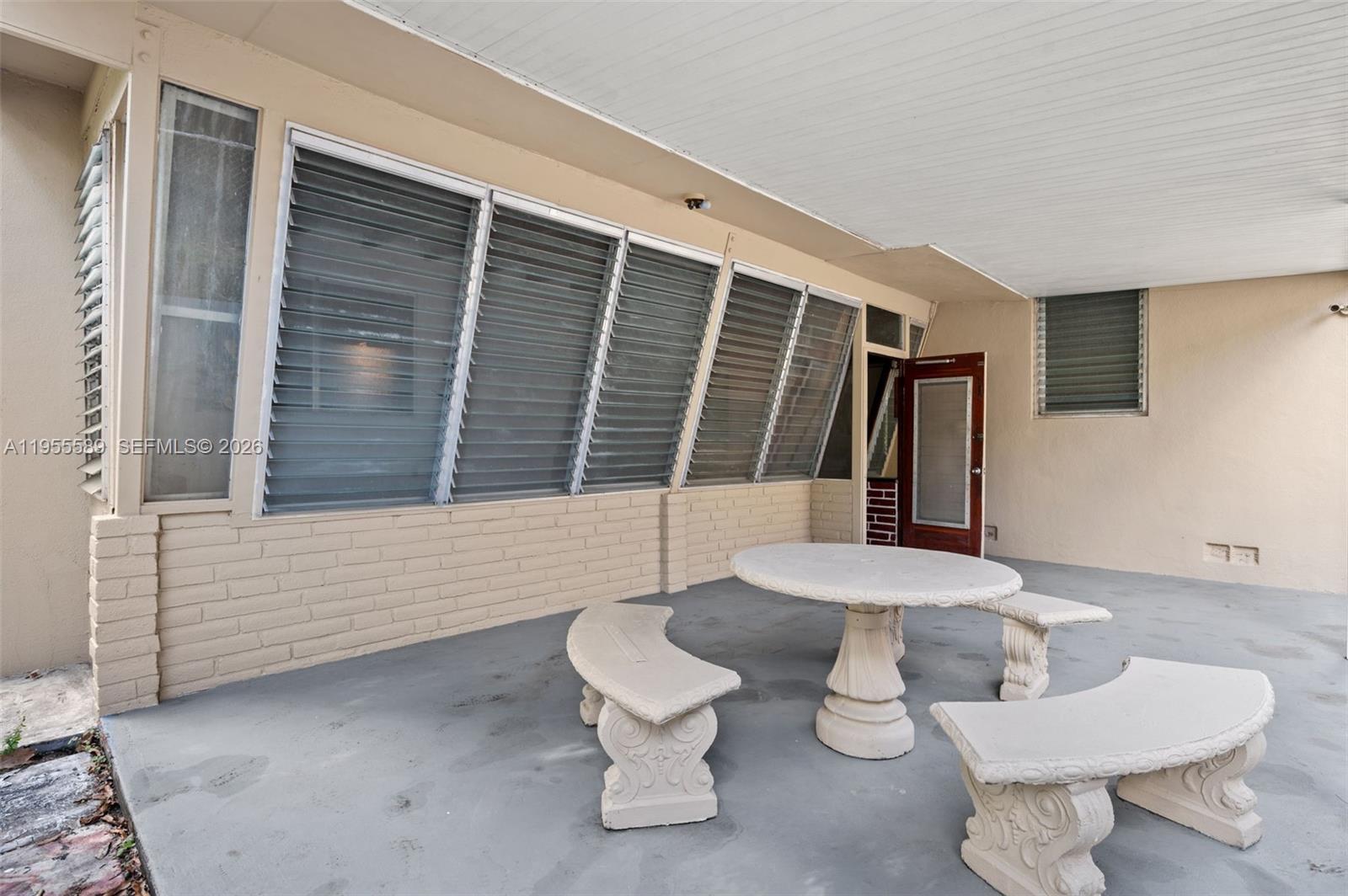 42 East 16th Street Hialeah, FL 33010 - Photo 24 of 30 a bathroom with a toilet and a sink