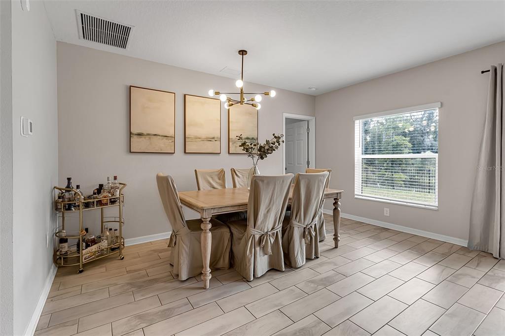 5434 Patano Loop Palmetto, FL 34221 - Photo 24 of 93 a view of a dining room with furniture