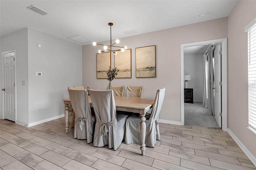 5434 Patano Loop Palmetto, FL 34221 - Photo 25 of 93 a view of a dining room with furniture