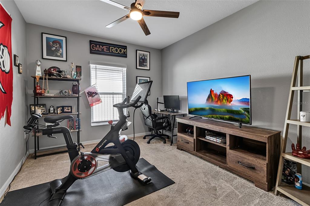 5434 Patano Loop Palmetto, FL 34221 - Photo 35 of 93 a view of a room with gym equipment