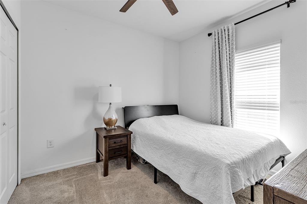 5434 Patano Loop Palmetto, FL 34221 - Photo 38 of 93 a bedroom with a bed and a window