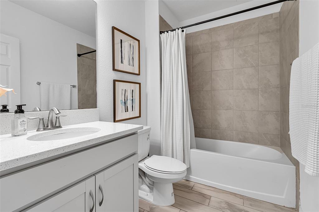 5434 Patano Loop Palmetto, FL 34221 - Photo 42 of 93 a bathroom with a sink a toilet and a bathtub