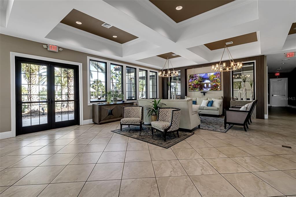 5434 Patano Loop Palmetto, FL 34221 - Photo 67 of 93 a living room with furniture and a floor to ceiling window