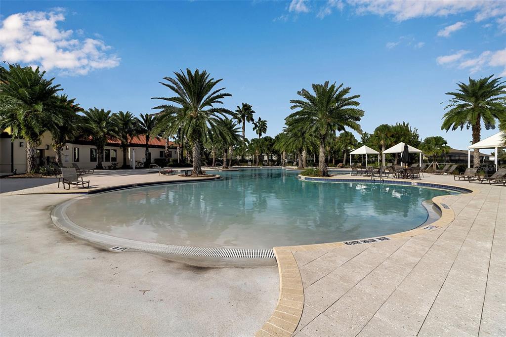 5434 Patano Loop Palmetto, FL 34221 - Photo 74 of 93 a view of a swimming pool with a table and chairs