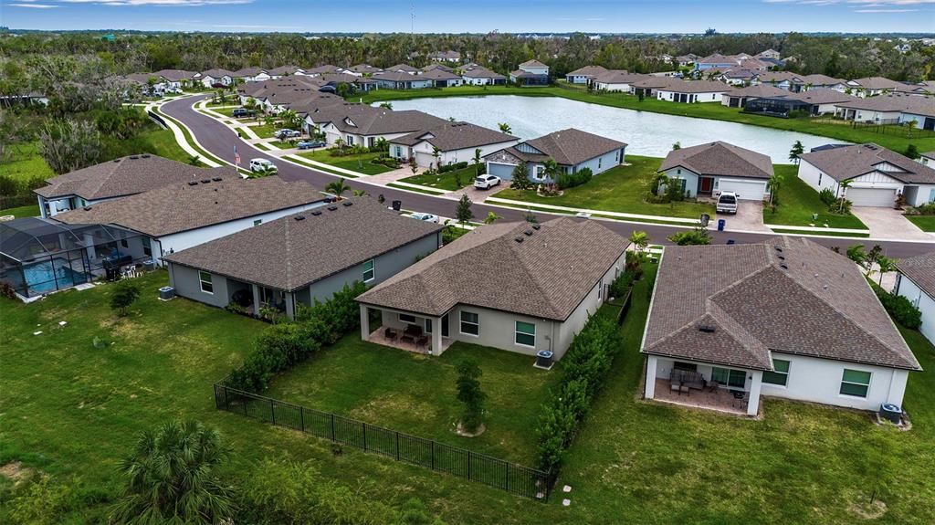 5434 Patano Loop Palmetto, FL 34221 - Photo 84 of 93 an aerial view of residential houses with outdoor space and trees