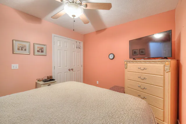 a view of balcony with wooden floor and outdoor seating