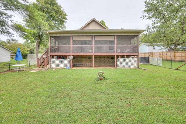 a view of a house with a big yard