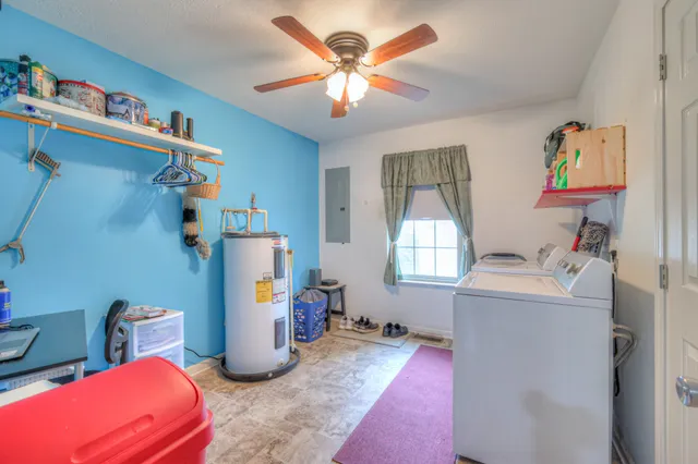 a room with furniture and a flat screen tv
