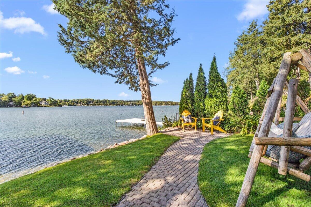 4763 Fontana Beach Road Polk, WI 53086 - Photo 6 of 61 Flat + plush grass by the water