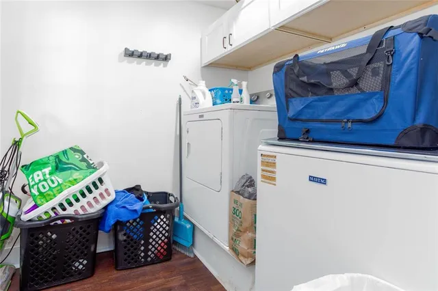 a view of a chairs and table in the patio