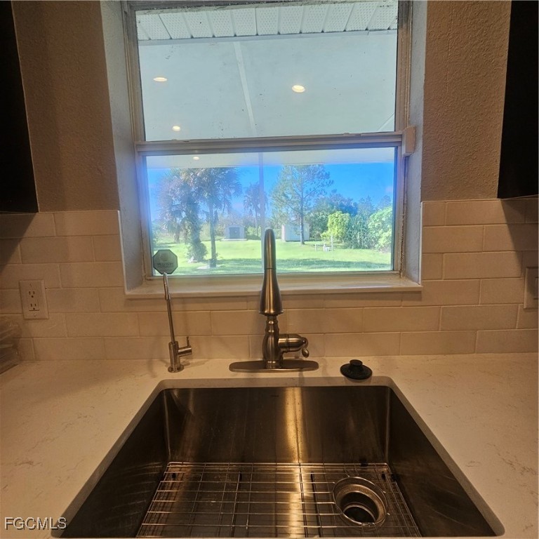 3780 Randall Boulevard Naples, FL 34120 - Photo 4 of 12 a view of a sink with wooden floor