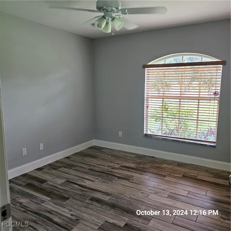 3780 Randall Boulevard Naples, FL 34120 - Photo 7 of 12 a view of an empty room with a window