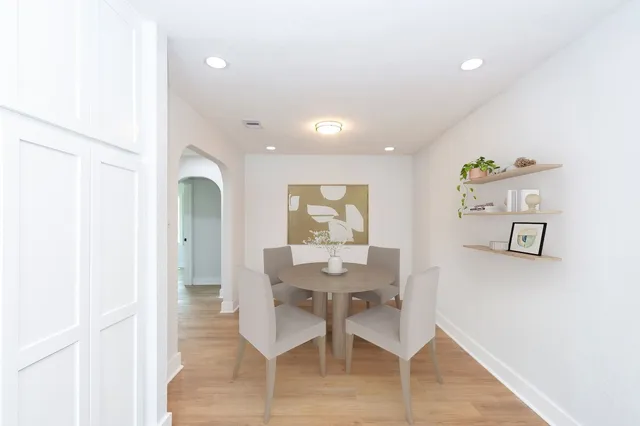 a view of a dining room with furniture