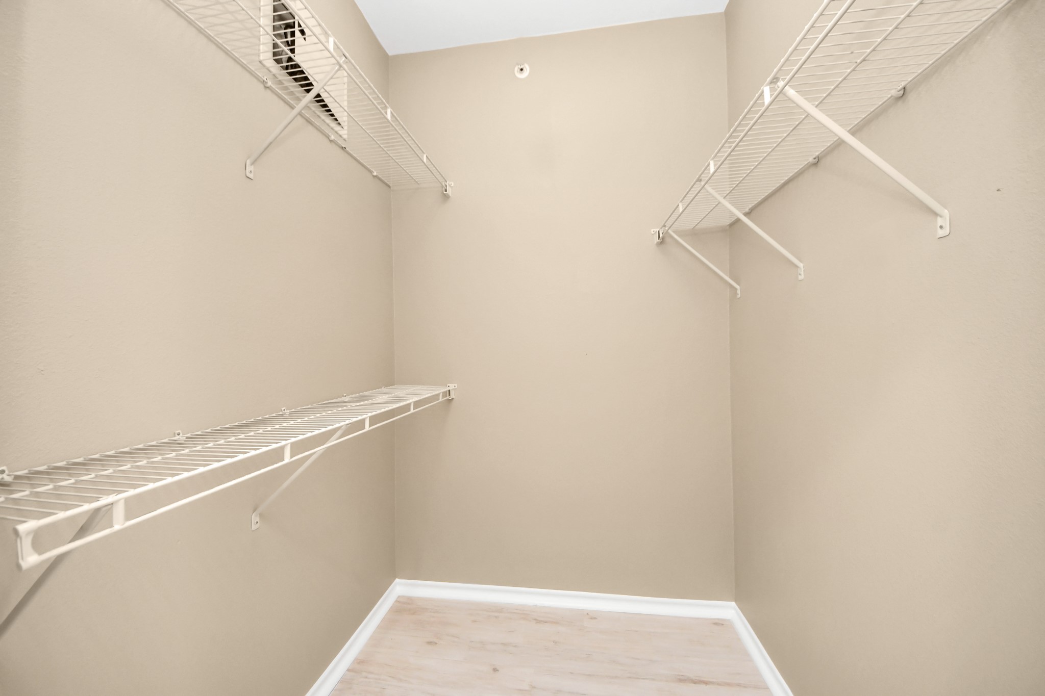 2400 McCue Road, Unit 333 Houston, TX 77056 - Photo 18 of 50 a view of small space with racks on the wall
