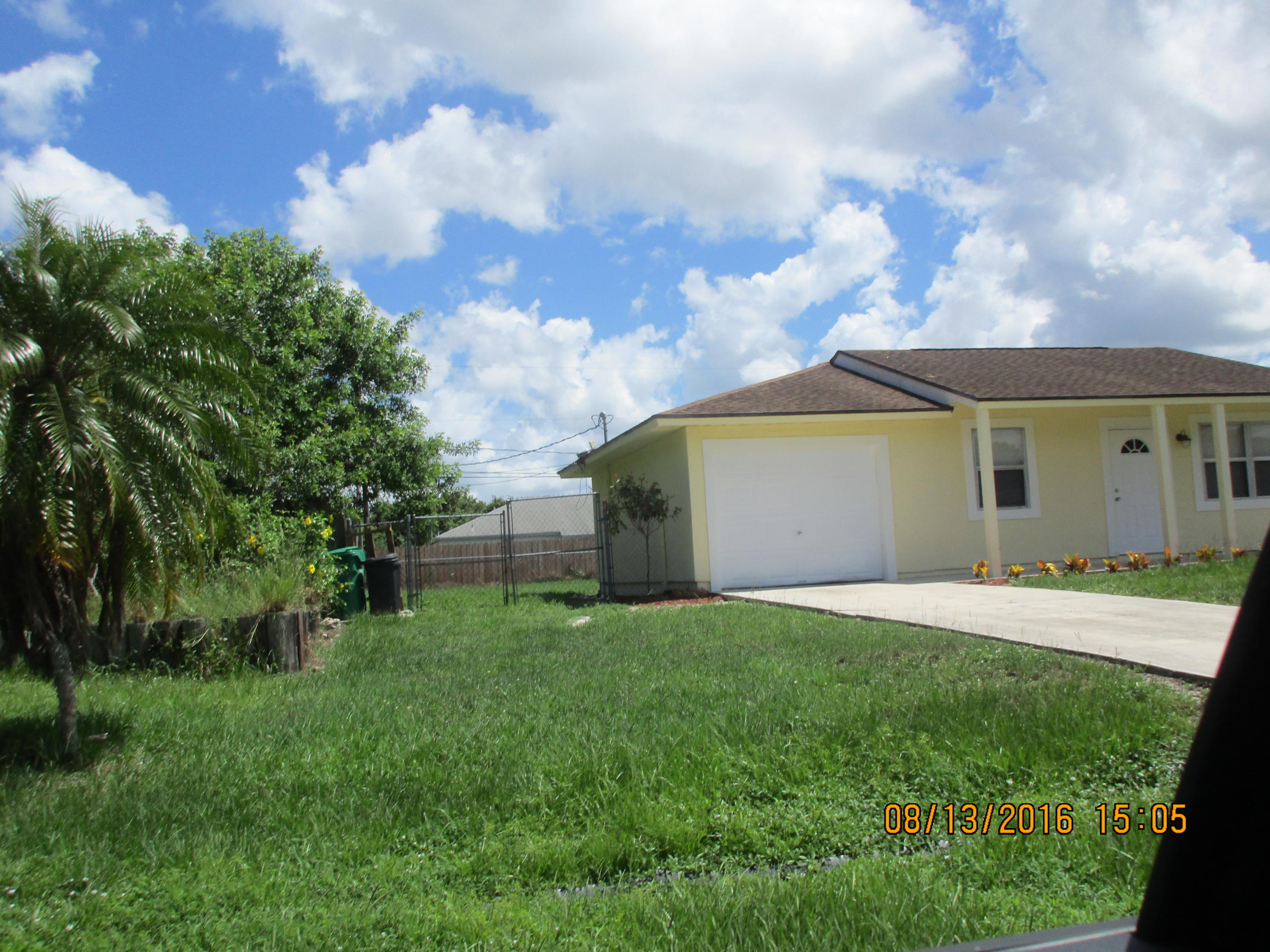 720 Southwest Monsoon Road Port St. Lucie, FL 34953 - Photo 2 of 10 IMG_1071