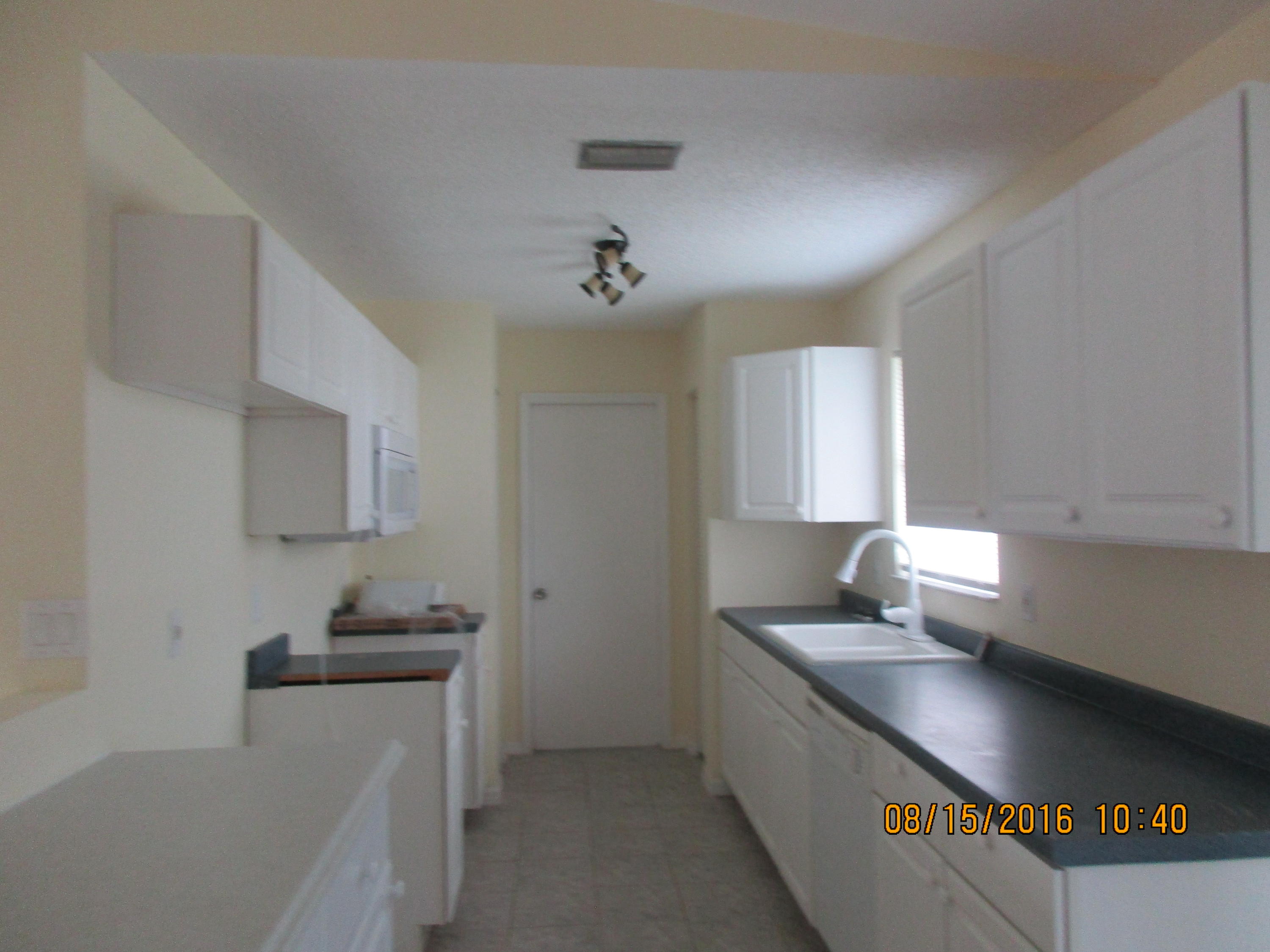 720 Southwest Monsoon Road Port St. Lucie, FL 34953 - Photo 5 of 10 IMG_1074