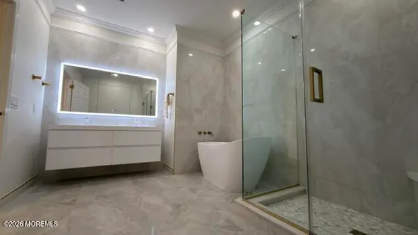 a bathroom with a toilet and shower