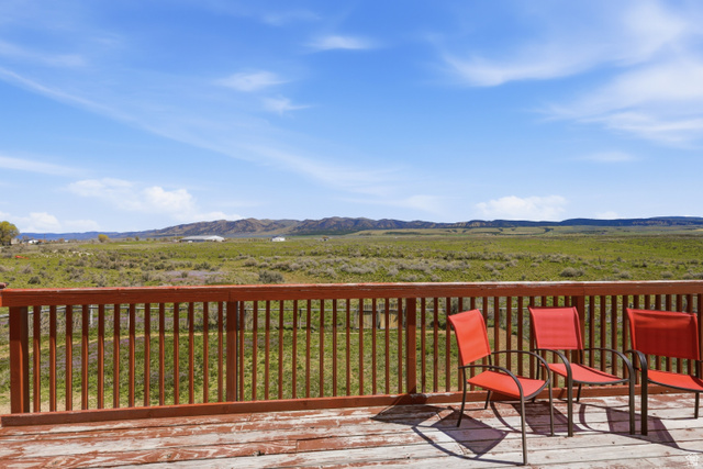 830 North Stone Road Snowville, UT 84336 - Photo 44 of 69 Wooden terrace with a mountain view