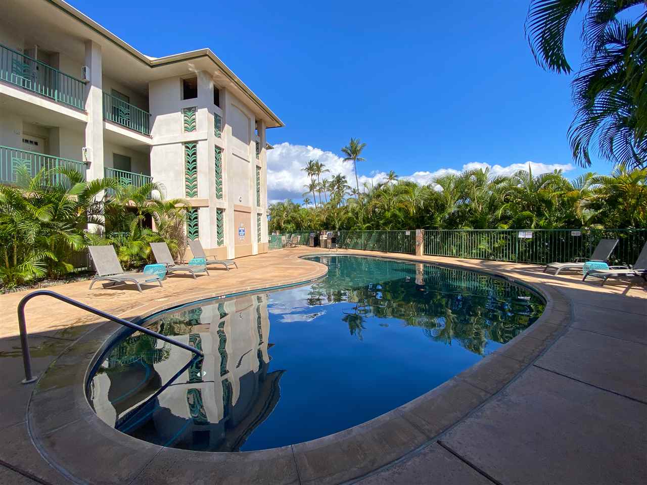 44 Kanani Road, Unit 2202 Kihei, HI 96753 - Photo 28 of 30 a view of a swimming pool with a patio