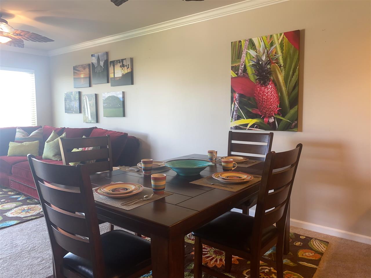 44 Kanani Road, Unit 2202 Kihei, HI 96753 - Photo 8 of 30 a view of a dining room with furniture and wooden floor