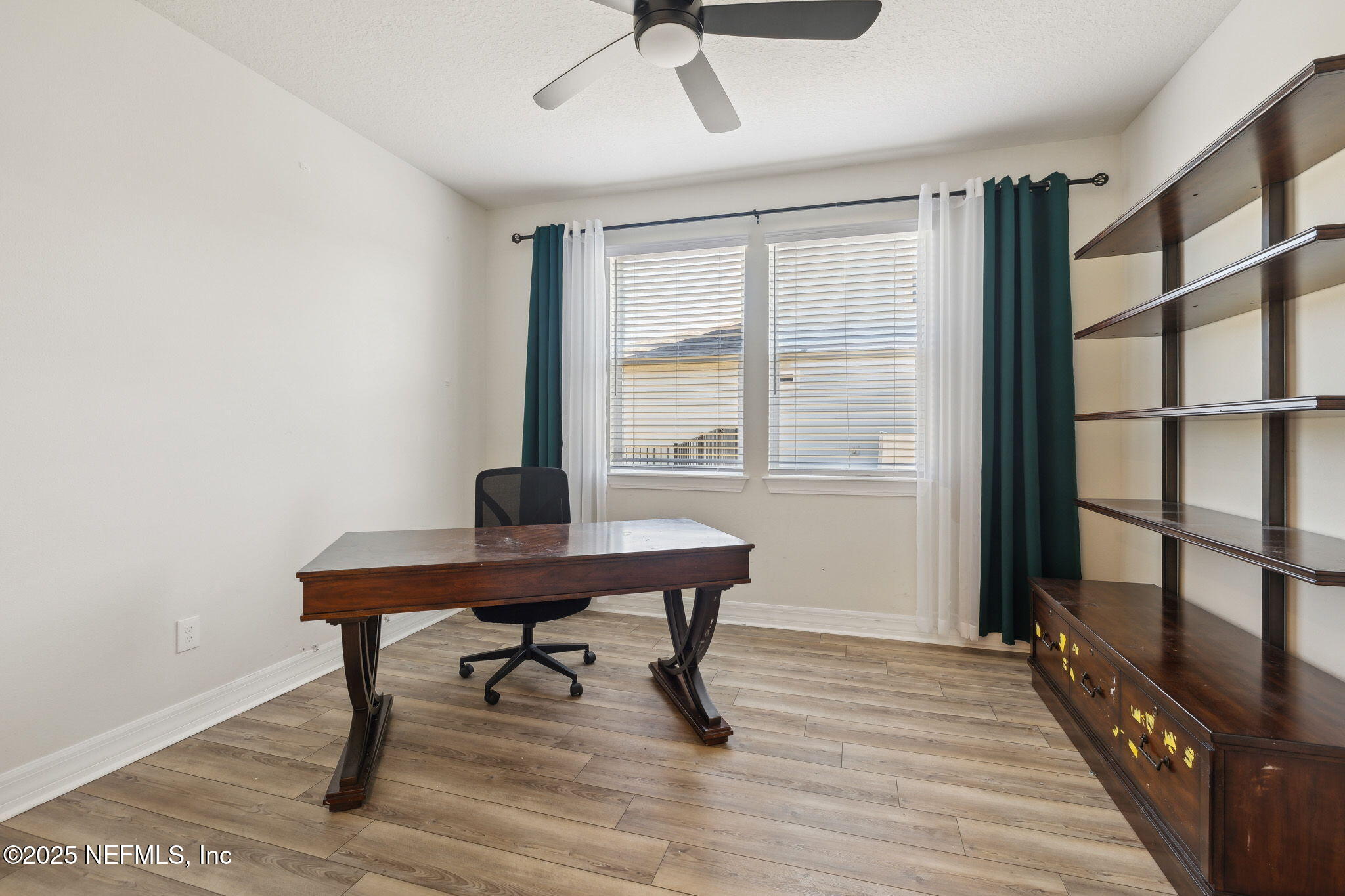 100 Red Barn Road St. Augustine, FL 32092 - Photo 20 of 86 a view of a workspace with furniture and a window