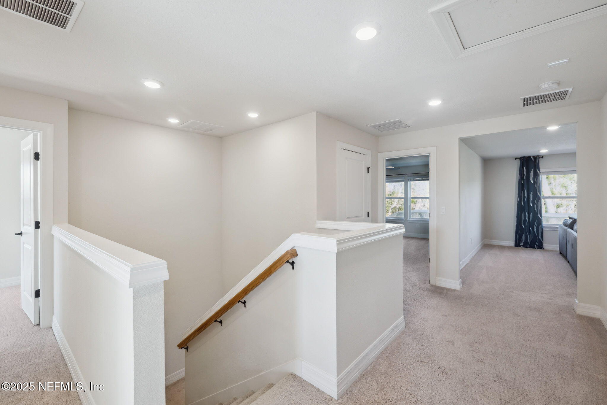 100 Red Barn Road St. Augustine, FL 32092 - Photo 28 of 86 a view of a hallway with a kitchen
