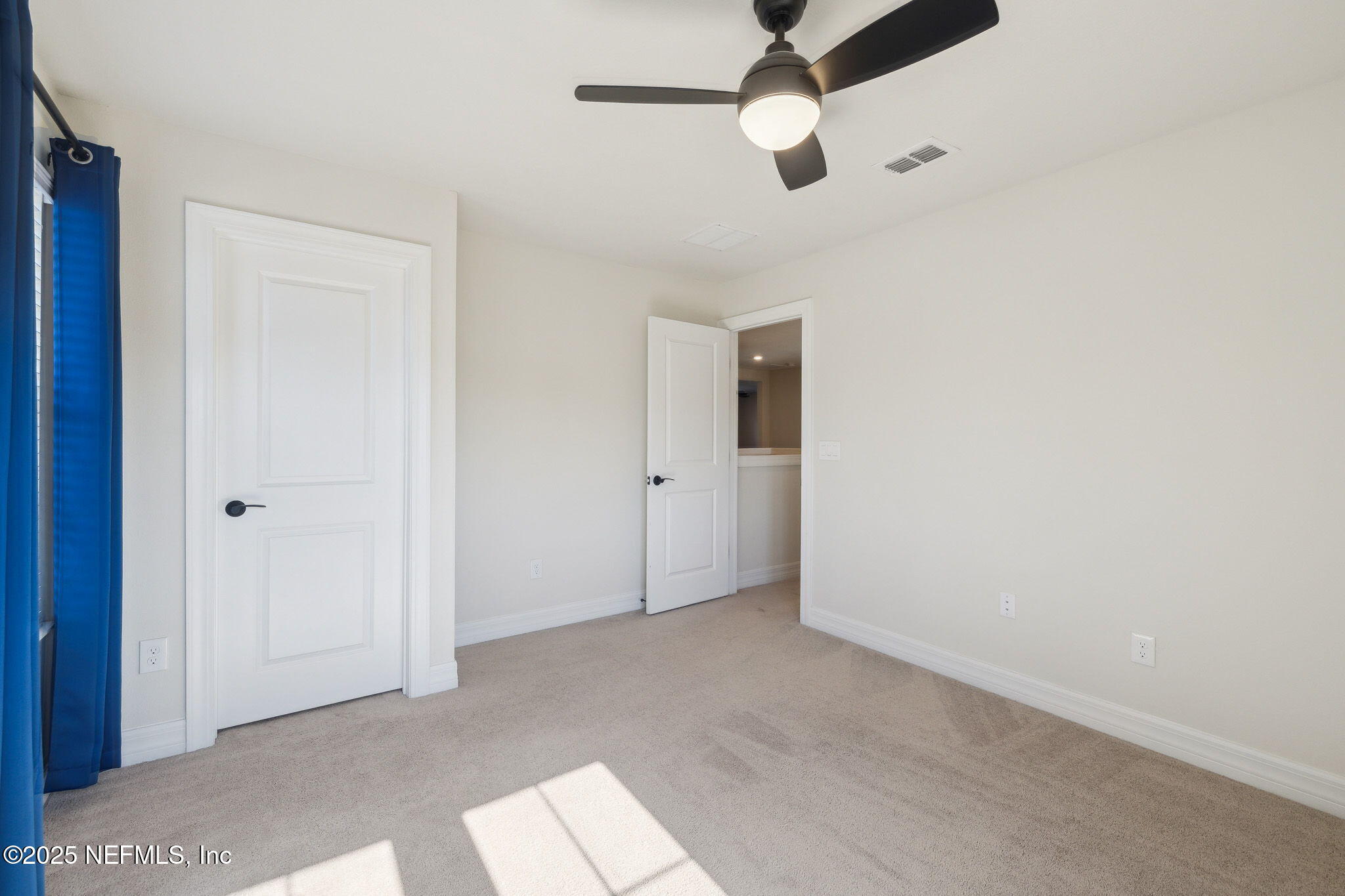 100 Red Barn Road St. Augustine, FL 32092 - Photo 40 of 86 an empty room with chandelier fan
