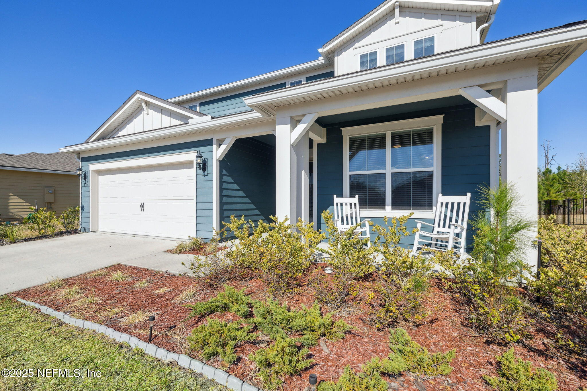 100 Red Barn Road St. Augustine, FL 32092 - Photo 5 of 86 a front view of a house with garden