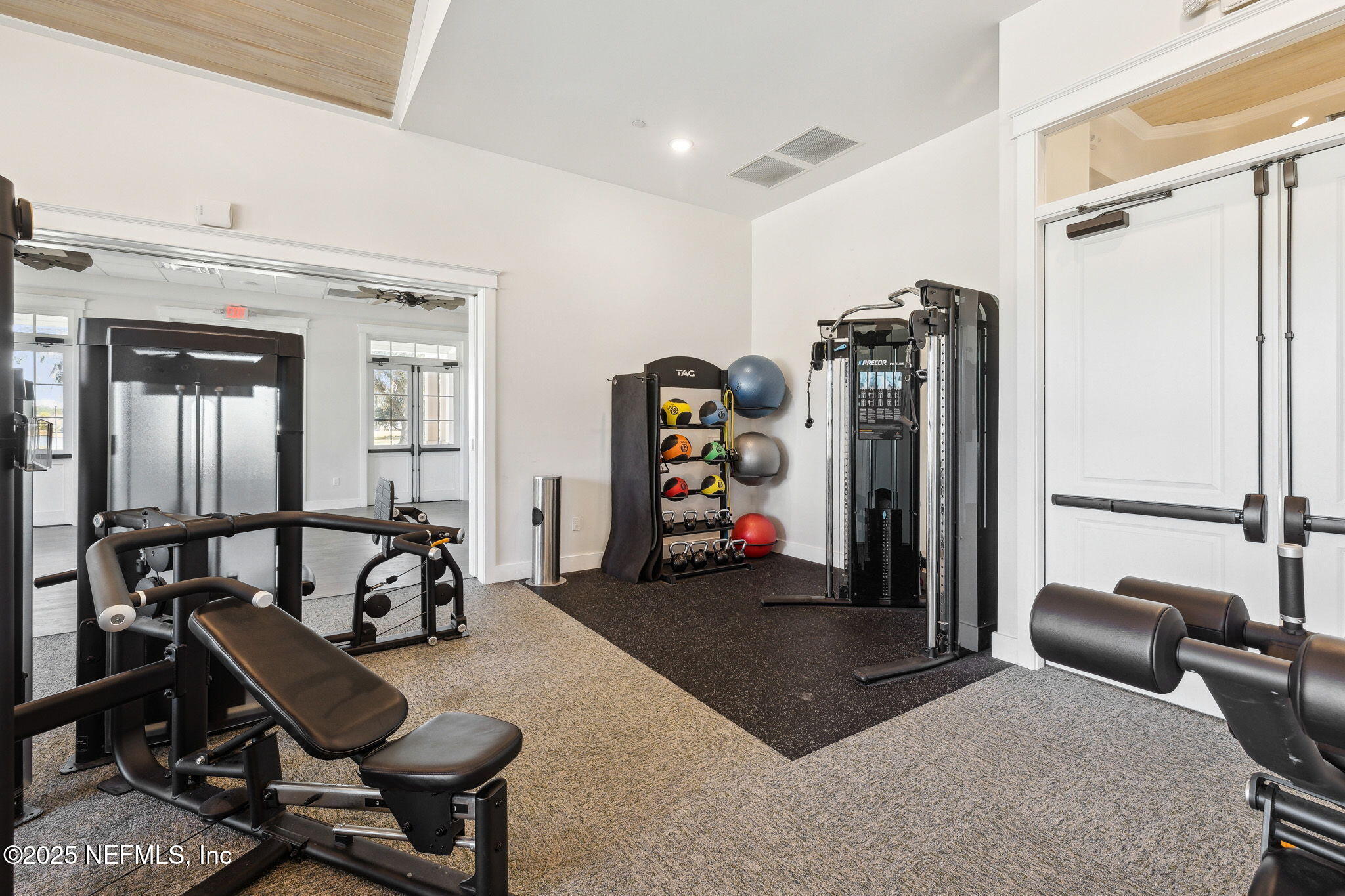 100 Red Barn Road St. Augustine, FL 32092 - Photo 68 of 86 a room with furniture a rug and gym equipment