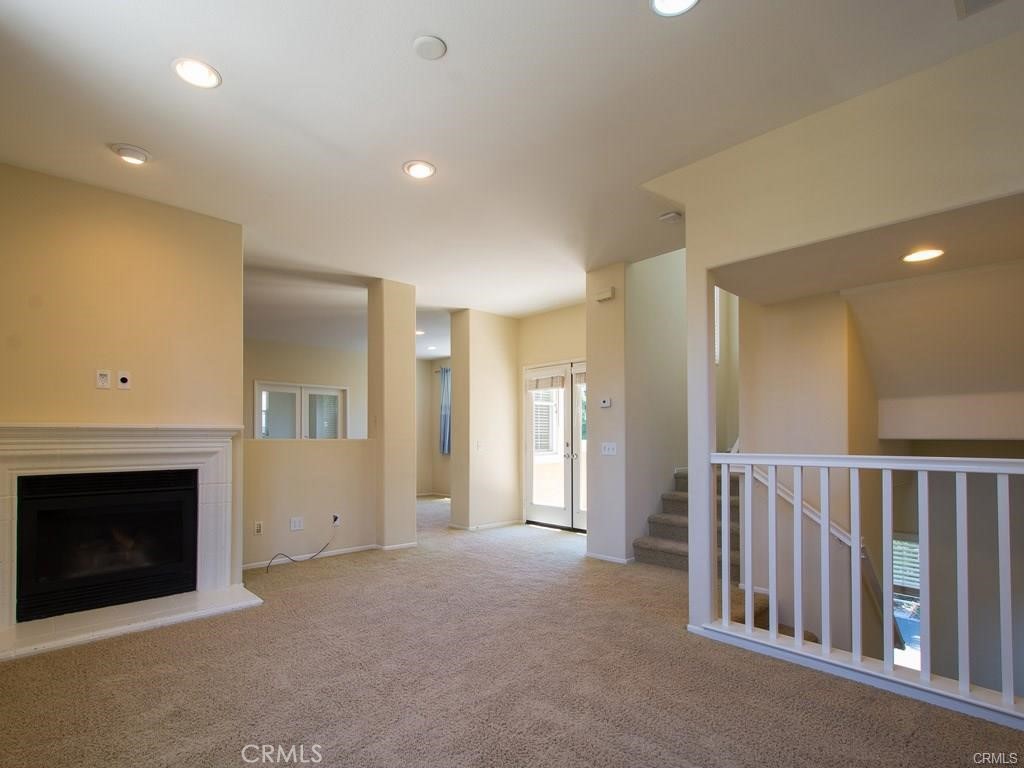 7 Silvermaple Irvine, CA 92618 - Photo 2 of 21 a view of a livingroom with a fireplace