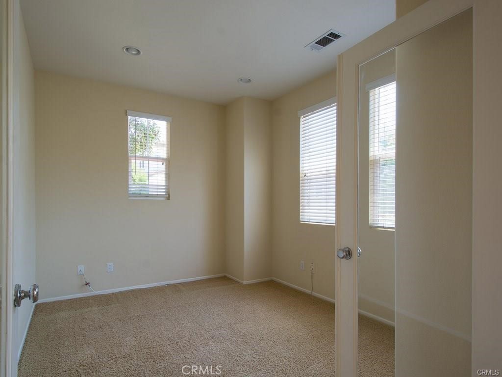 7 Silvermaple Irvine, CA 92618 - Photo 8 of 21 a view of an empty room with a window