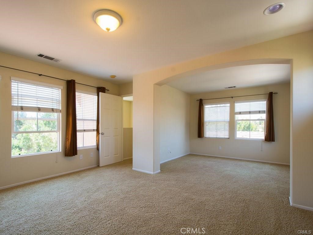 7 Silvermaple Irvine, CA 92618 - Photo 10 of 21 a view of an empty room with a window