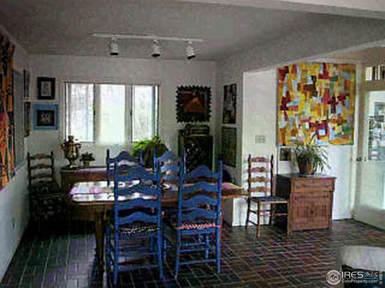 117 Apple Ridge Road Lyons, CO 80540 - Photo 8 of 11 a view of a dining room with furniture and wooden floor
